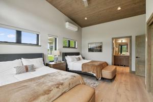 Postel nebo postele na pokoji v ubytování Mara Luxury Cabin- Maple