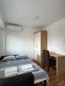 Ένα ή περισσότερα κρεβάτια σε δωμάτιο στο Urban Haven