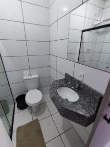 Koupelna v ubytování PORTAL PARQUE HOTEL