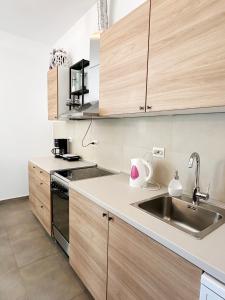 Η κουζίνα ή μικρή κουζίνα στο Seaside Apartments