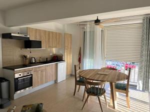 Köök või kööginurk majutusasutuses Superbe 2 chambres avec piscine