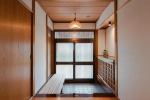 Ein Bett oder Betten in einem Zimmer der Unterkunft 一棟貸切の和風プライベートヴィラ プール花火バーベキュー