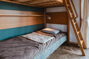 Ein Bett oder Betten in einem Zimmer der Unterkunft 一棟貸切の和風プライベートヴィラ プール花火バーベキュー