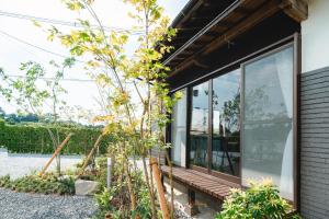 Ein Garten an der Unterkunft 一棟貸切の和風プライベートヴィラ プール花火バーベキュー