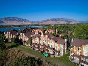 an aerial view of a home with mountains in the background at Snowbasin Haven with Hot Tub and Resort Amenities in Huntsville