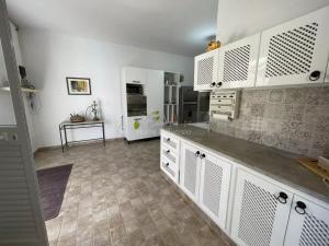 Kuchyň nebo kuchyňský kout v ubytování location Maison d hotes a Chott Meriem