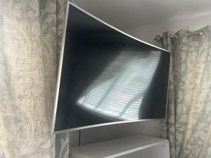 TV a/nebo společenská místnost v ubytování Natonia House