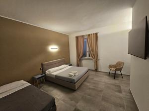 Postel nebo postele na pokoji v ubytování La Casa in Rivalta