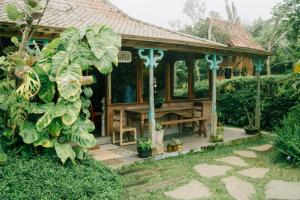 Zahrada ubytování Pondok Batur in Kawinaya + 3 fotografie