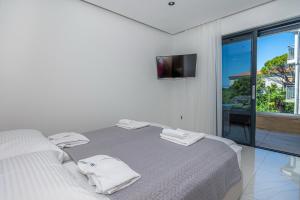 Postel nebo postele na pokoji v ubytování Villa Lana