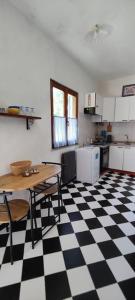 Kuchyň nebo kuchyňský kout v ubytování Appartement Gatti