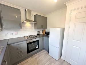 Kuchyň nebo kuchyňský kout v ubytování No 203 by Blue Skies Stays + 3 fotografie