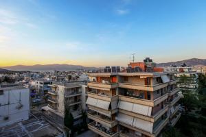 a view of a city from a building at Loft condo next to metro station. Amazing view! in Athens