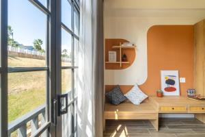 Postel nebo postele na pokoji v ubytování Nhà phố 3Pn Coral Home Novaworld Phan Thiết