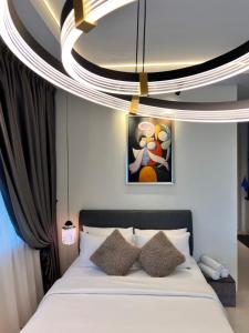 Postel nebo postele na pokoji v ubytování LoFF Suite 2 Bedroom at Kuching Riverine Resort