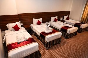 Katil atau katil-katil dalam bilik di فندق أبراج المسك Abraj Almisk Hotel +34 gambar