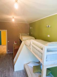 Postel nebo postele na pokoji v ubytování Magazzini Sasso Guest House
