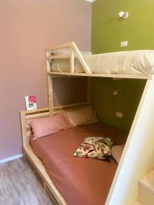 Postel nebo postele na pokoji v ubytování Magazzini Sasso Guest House