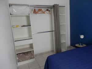 Ένα ή περισσότερα κρεβάτια σε δωμάτιο στο agréable appartement T2 avec piscine