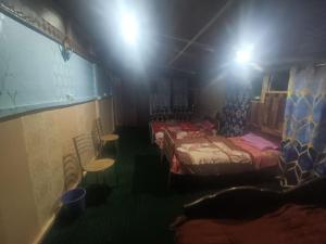 Letto o letti in una camera di Hotel New Heaven Canal