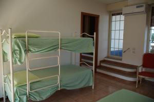 A bed or beds in a room at Casa Vacanze Sergio