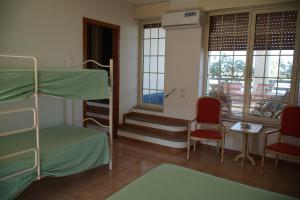 A bed or beds in a room at Casa Vacanze Sergio