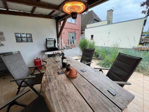 Ruang duduk di Küstenfeeling - die Relax- FeWo für Ihren Nordseeurlaub mit ganz vielen Extras! +42 gambar