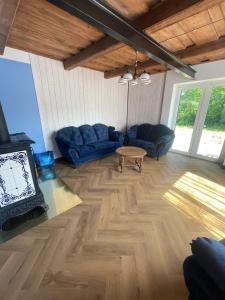 Posezení v ubytování More Holiday Cottage L