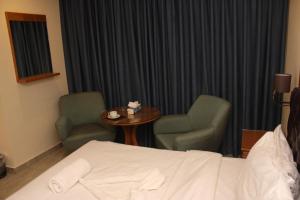Kama o mga kama sa kuwarto sa Jawheret Alswefia Hotel Suite