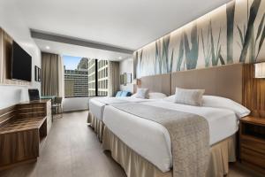 Riu Plaza Chicago客房内的一张或多张床位