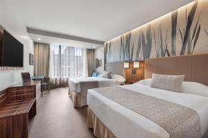 Riu Plaza Chicago客房内的一张或多张床位