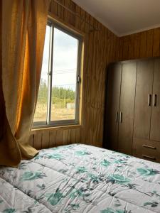 Postel nebo postele na pokoji v ubytování Acogedora cabaña amoblada
