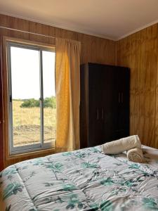 Postel nebo postele na pokoji v ubytování Acogedora cabaña amoblada