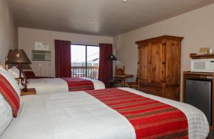 Postel nebo postele na pokoji v ubytování Beaver Creek Inn