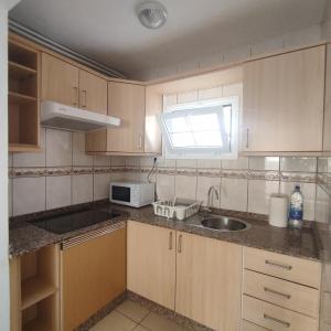 A kitchen or kitchenette at My Little Bungalow