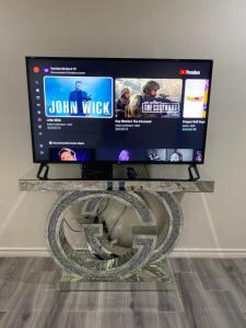 TV a/nebo společenská místnost v ubytování Comfortable Living + 9 fotografií