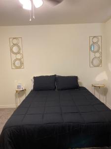 Postel nebo postele na pokoji v ubytování Comfortable Living