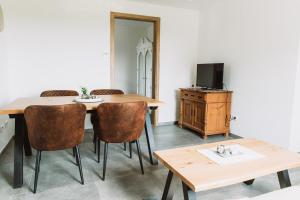 TV a/nebo společenská místnost v ubytování Ferienwohnung Seeliebe + 33 fotografií