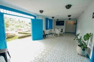 TV a/nebo společenská místnost v ubytování Hotel Concepción Antioquia
