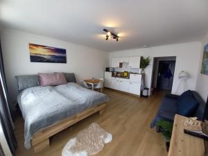 Postel nebo postele na pokoji v ubytování Apartment Auszeit Strobl