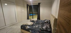 Postel nebo postele na pokoji v ubytování Villas Lumières, Luxe, calme et confort
