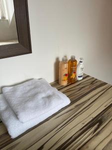 a bathroom with a towel on a wooden counter at Town centre, very convenient in Newcastle under Lyme +31 photos