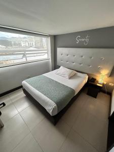 Postel nebo postele na pokoji v ubytování Aw Hotel Serenity Ferial