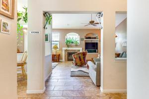 a living room with a couch and a fireplace at Reno Home with Game Room 5 Mi to Downtown! in Reno