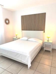 Postel nebo postele na pokoji v ubytování B&B Gino