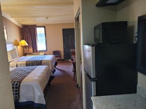 Postel nebo postele na pokoji v ubytování Stay Express Inn Athens