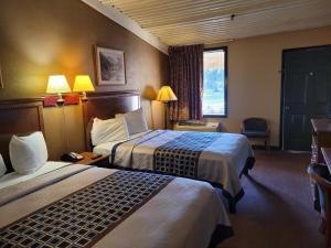 Postel nebo postele na pokoji v ubytování Stay Express Inn Athens