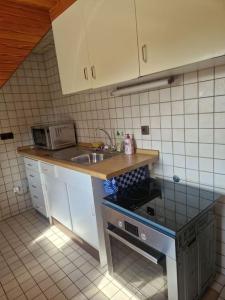 Køkken eller tekøkken på Appartement mit 2 separaten Schlafzimmern + 13 billeder