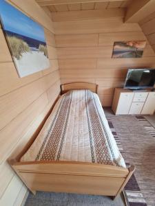 En eller flere senge i et værelse på Appartement mit 2 separaten Schlafzimmern