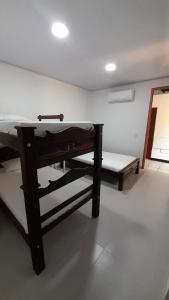 Llit o llits en una habitació de Posada San Carlos